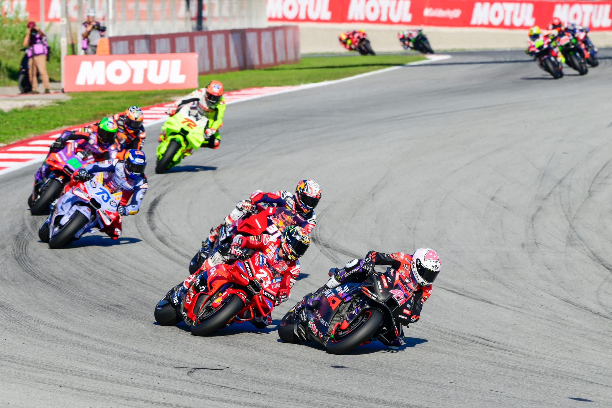 Enea Bastianini battles Aleix Espargaro during the Solidarity Grand Prix