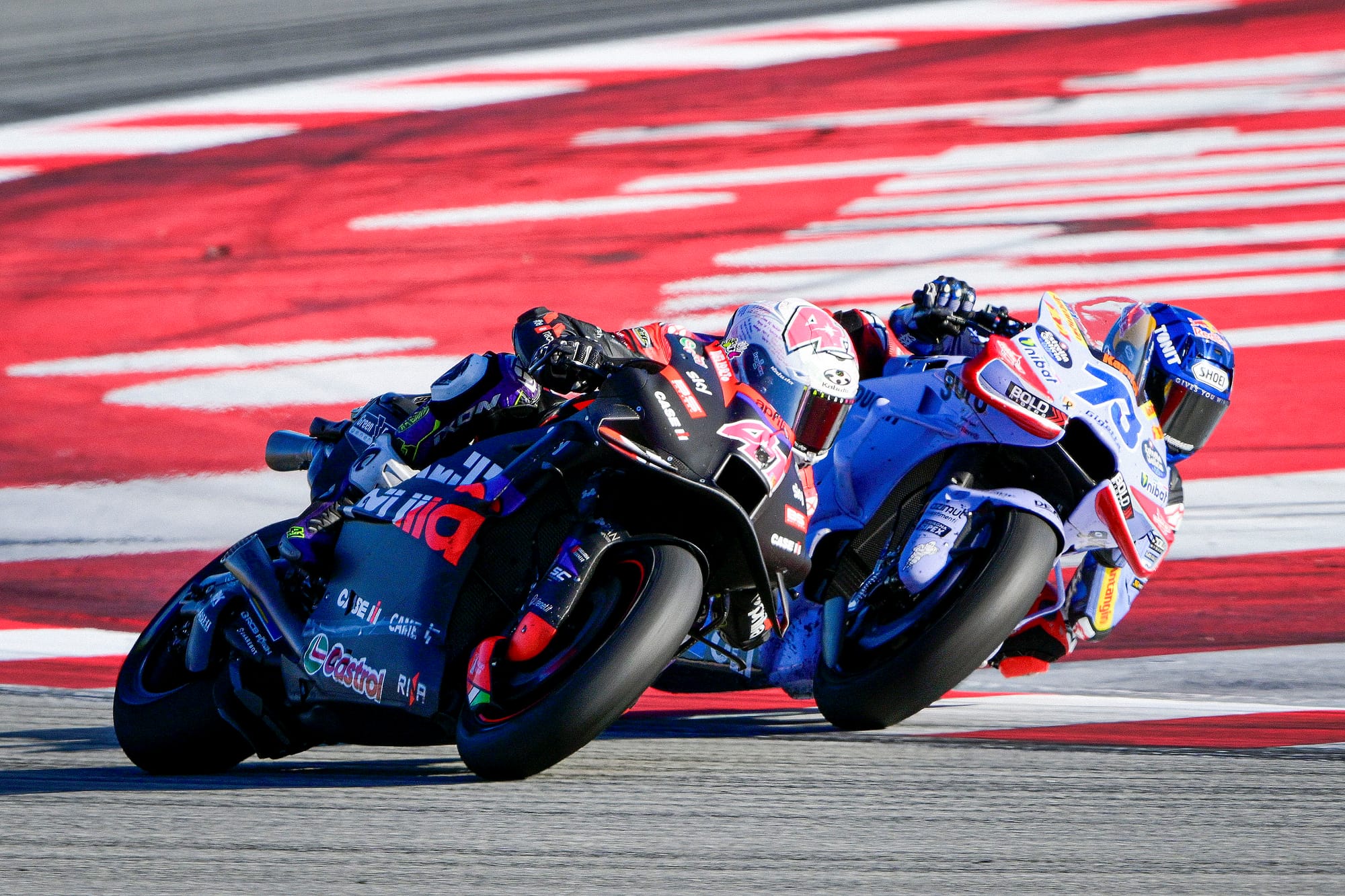 Aleix Espargaro races Alex Marquez during the Solidarity Grand Prix