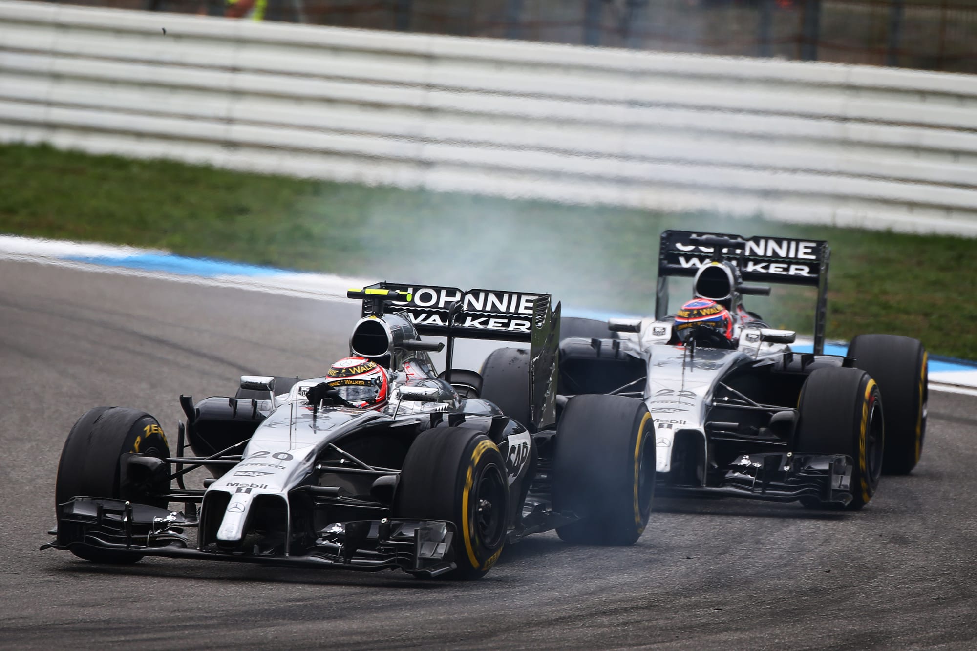 Kevin Magnussen Jenson Button McLaren F1 2014