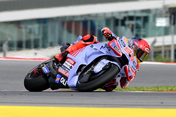 Marc Marquez racing to the right on his Ducati MotoGP bike at Portimao