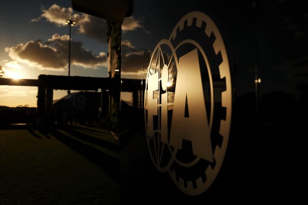 FIA logo under sunset